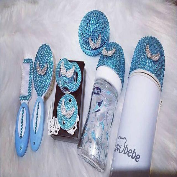 https://blingblingbabies.com/cdn/shop/products/blingbabycrystalrhinestonesbabyhpacifierbottlecomboset_grande.jpg?v=1610775825